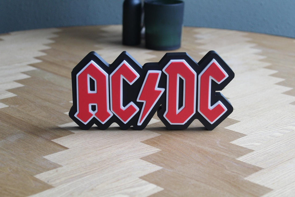 AC/DC Logo 3D Druck | Rock Band Deko | Musik Fanartikel | Geschenk für Rockliebhaber | Rock 'n' Roll Sammlung | Figur Deko Schild