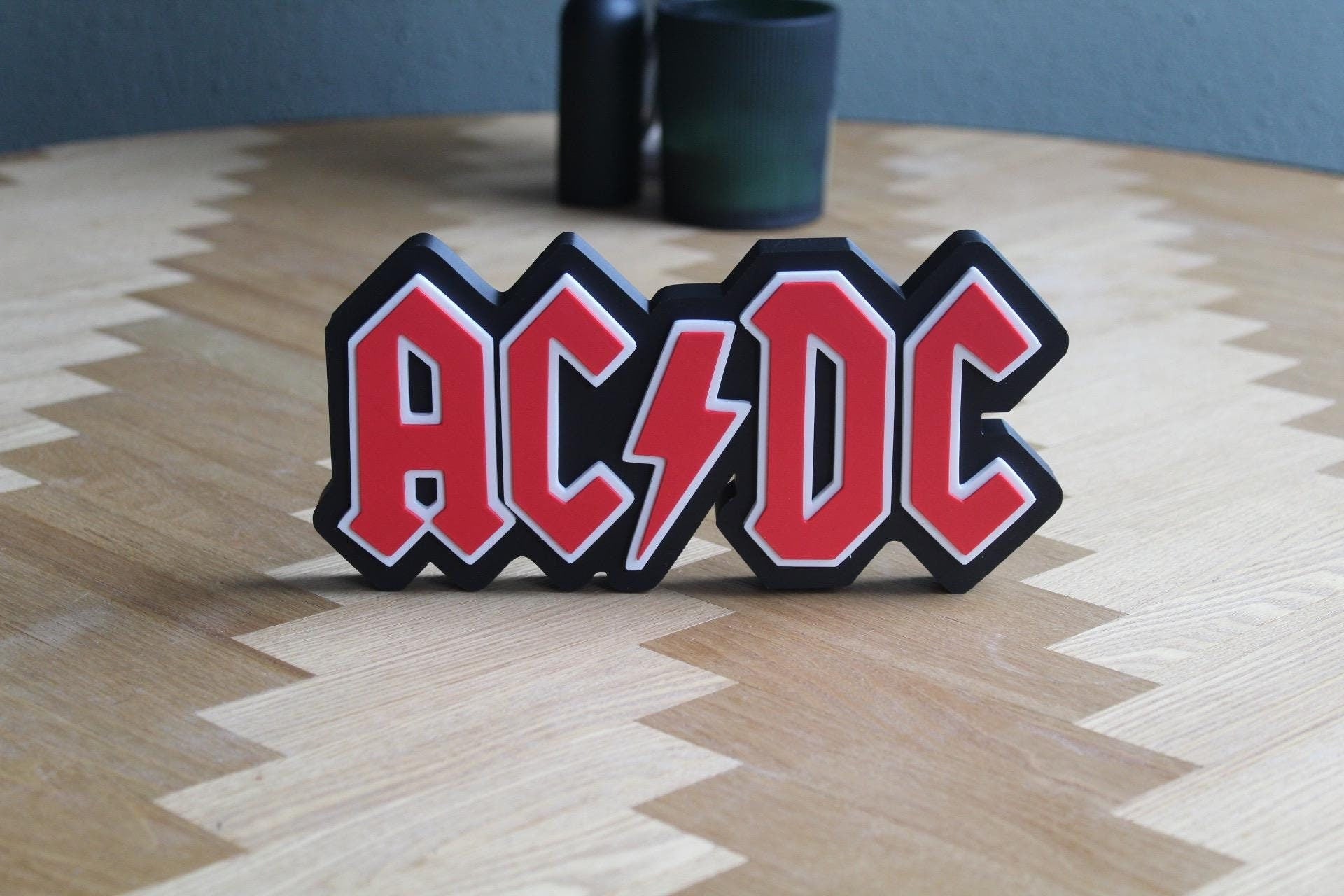 AC/DC Logo 3D Druck | Rock Band Deko | Musik Fanartikel | Geschenk für Rockliebhaber | Rock 'n' Roll Sammlung | Figur Deko Schild
