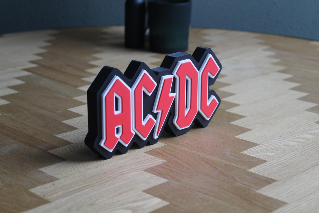 AC/DC Logo 3D Druck | Rock Band Deko | Musik Fanartikel | Geschenk für Rockliebhaber | Rock 'n' Roll Sammlung | Figur Deko Schild